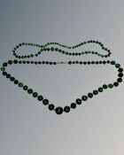 Two strands of malachite beads.