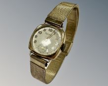 An early 20th century lady's Rotary wrist watch, 9ct yellow gold backed on plated strap.