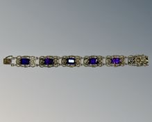 A sterling silver amethyst panel bracelet, length 18cm.