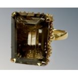 An 18ct yellow gold smokey quartz ring, R 1/2, 18 mm x 13 mm, 9.6g.