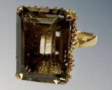 An 18ct yellow gold smokey quartz ring, R 1/2, 18 mm x 13 mm, 9.6g.