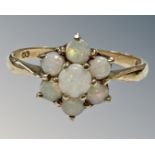 A 9ct gold opal cluster ring, cluster diameter 9 mm, size L, 1.5g.