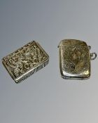 Two silver vesta cases, including one example in the form of a bible.