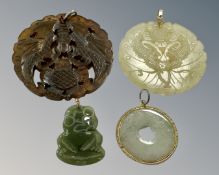 Four Chinese carved pendants, Jade etc.