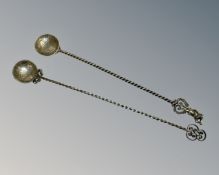Two ornate continental silver spoons.