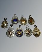Eight antique silver fobs.