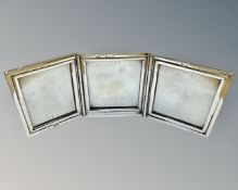 An antique silver triple photograph frame, Chester 1921 marks, height 5.