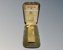 A gold plated Dunhill lighter, cased with original instructions.