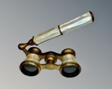 An antique pair opera glasses with mother of pearl mounts.