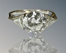 A solitaire diamond ring, the brilliant-cut stone weighing approximately 2.