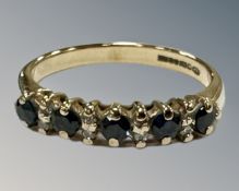 A 9ct gold synthetic sapphire and diamond half eternity ring, 2.4g, N 1/2.