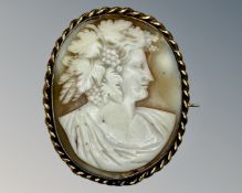 An antique cameo brooch, 4.5cm by 4cm.