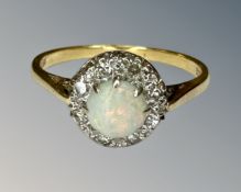 An antique 18ct gold opal and diamond ring, size N½.