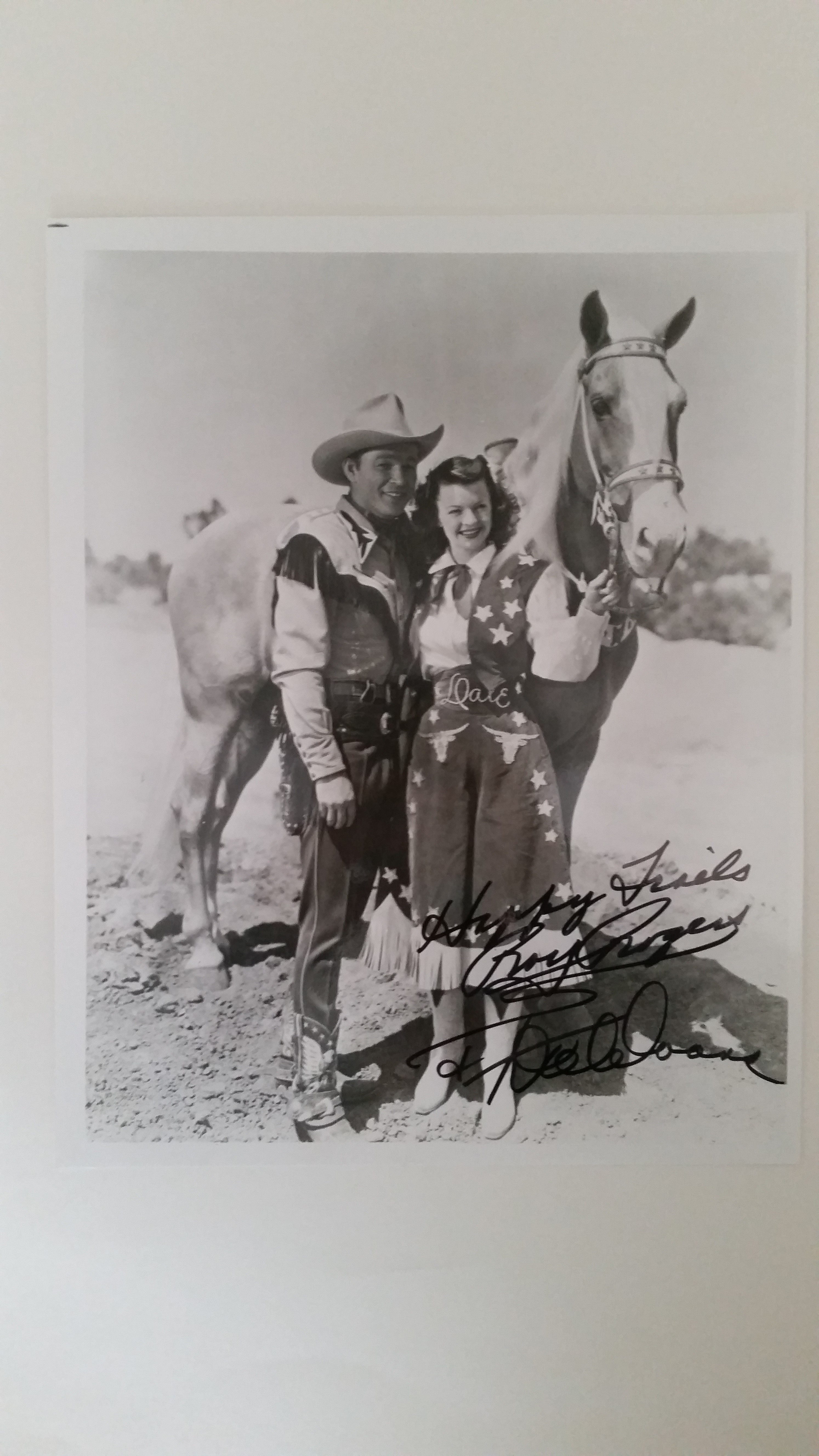 CINEMA, signed photo by Roy Rogers & Dale Evans, showing them in cowboy character with Trigger, 8