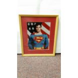 CINEMA, Superman, signed colour photo by Christopher Reeve, half-length as Superman, overmounted,