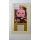 ENTERTAINMENT, signed album page by Simone Simon, overmounted beneath photo, h/s, 11 x 18 overall,