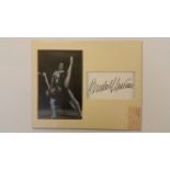 ENTERTAINMENT, signed card by Rudolf Nureyev, black ink, overmounted to the side of b/w photo