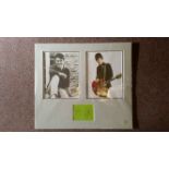 POP MUSIC, The Smiths, signed album page by Morrissey and Johnny Marr, overmounted beneath photos of