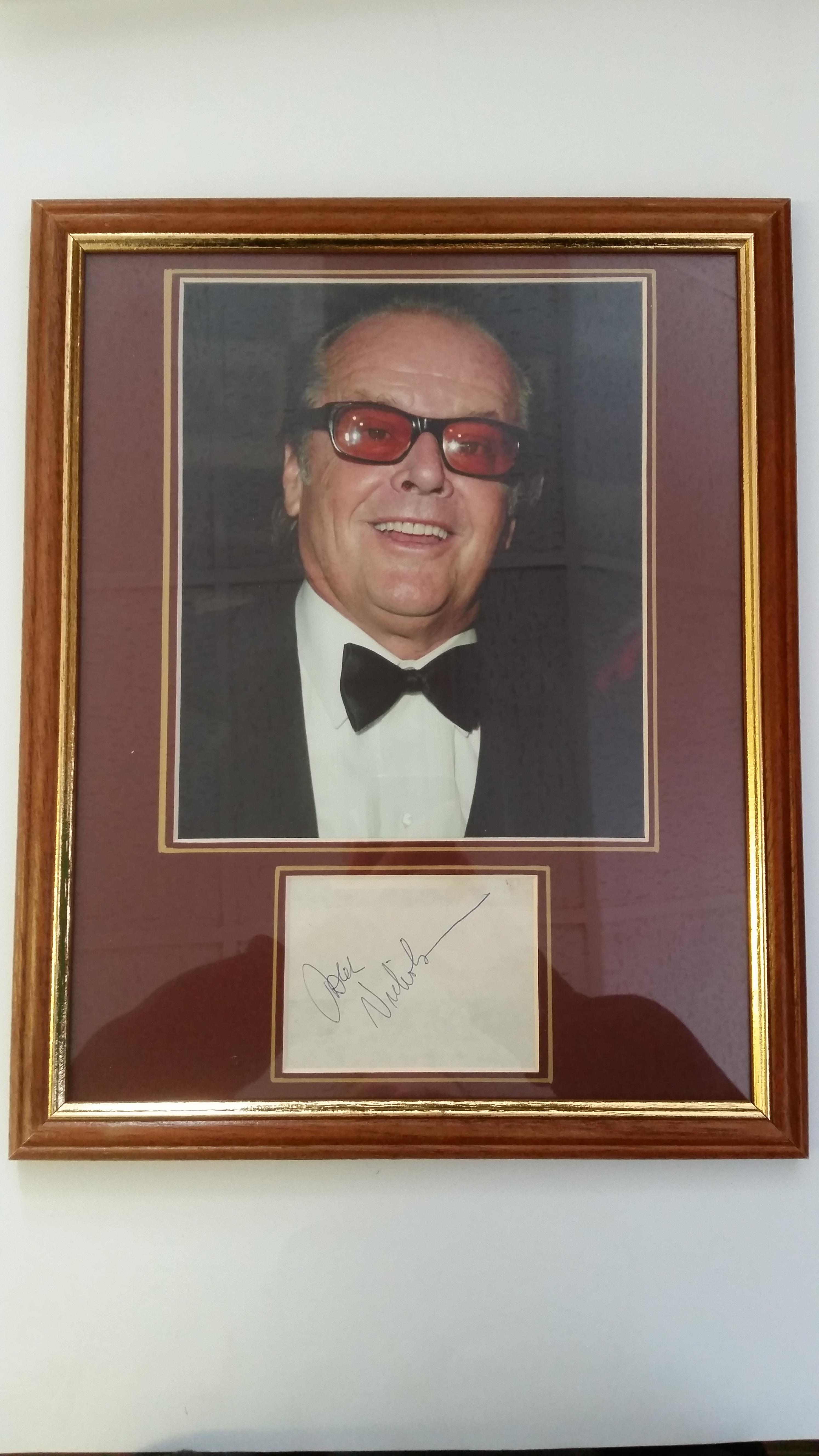 CINEMA, signed album page by Jack Nicholson, overmounted beneath photo, h/s in black tie, 12.5 x