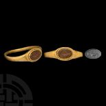 Roman Gold Ring with Clasped Hands Gemstone