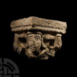 Medieval Stone Capital with Four Faces