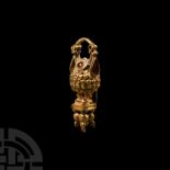 Hellenistic Gold Earring with Filigree and Garnets