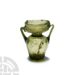 Roman Dark Green Glass Jar