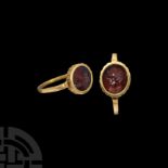 Roman Gold Ring with Garnet Portrait Gemstone