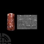 Neo-Assyrian Carnelian Cylinder Seal with Presentation Scene