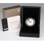 An Elizabeth II Royal Mint five ounce silver coin 2013 commemorating the 60th anniversary of the