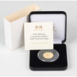 An Elizabeth II Harrington & Byrne eight gram gold proof Alderney sovereign 2018 commemorating the