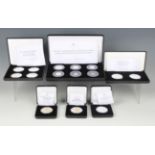 A collection of Elizabeth II Jubilee Mint silver commemorative coins, including a six-coin set