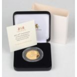 An Elizabeth II Harrington & Byrne gold proof fifty pence coin 2021 commemorating the 50th