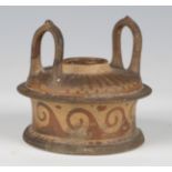 An ancient Greek earthenware pyxis type vessel, or lamp base, the twin-handled body with painted