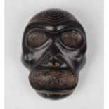 A pre-Columbian Taino style carved black stone zemi mask, Dominican Republic, probably 1000-1500 AD,