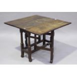 A small 17th century oak rectangular gateleg occasional table, fitted with a single drawer and