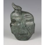 A pre-Columbian Mezcala style carved green hardstone avian mask, probably 700 BC-300 AD, with