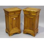 A pair of modern French cherry bedside cupboards, each fitted with a drawer and door, height 76cm,