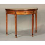 A George III satinwood fold-over demi-lune card table, the crossbanded top painted with a border