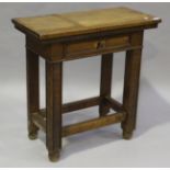 A 20th century French oak side table, fitted with a single drawer, height 85cm, width 84cm, depth