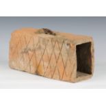 An ancient Roman terracotta flue brick with incised crosshatching to two sides, length 35cm.Buyer’