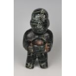 A pre-Columbian Olmec style carved variegated dark green hardstone stargazer figure, probably 900-