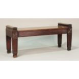A 19th century mahogany window seat, in the manner of Charles Heathcote Tatham, the rectangular seat