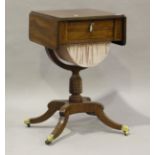 A Regency mahogany drop-flap work table, the reeded top above a writing drawer, a