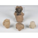 A group of four pre-Columbian pottery mask fragments, length of longest 10.5cm.Buyer’s Premium 29.4%