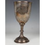 An Edwardian silver trophy cup, the 'U' shaped bowl engraved with ferns framing a presentation