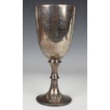 A George V silver trophy cup, the 'U' shaped bowl with engraved presentation inscription, on a