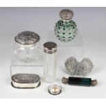 An Edwardian silver mounted green flash overlay cut glass globular scent bottle and stopper,