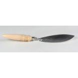 A Victorian silver and ivory handled fish slice, the blade engraved with fern fronds, the ivory