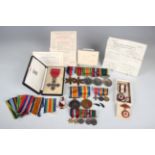 Two groups of medals to members of the How family, one group comprising MBE, civil issue, with